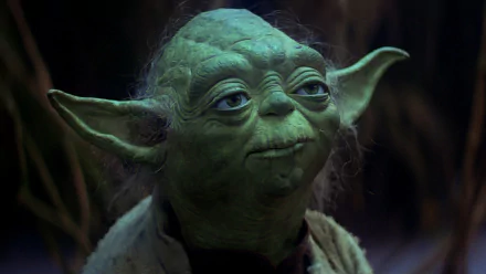 HD desktop wallpaper featuring Yoda, the Jedi Master from Star Wars Episode V: The Empire Strikes Back, with a detailed close-up of his face.