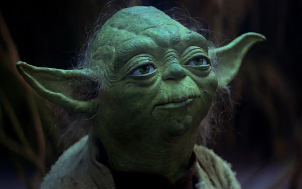 HD desktop wallpaper featuring Yoda, the Jedi Master from Star Wars Episode V: The Empire Strikes Back, with a detailed close-up of his face.