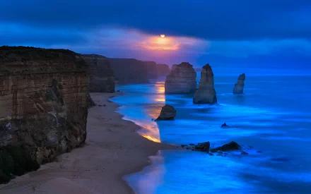A stunning view of the Twelve Apostles at dusk, showcasing rugged cliffs and the ocean reflecting the vibrant sunset, capturing the essence of nature along the coastline.