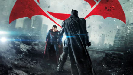 HD desktop wallpaper featuring Superman and Batman facing off amidst a battle-torn city, with a stylized Batman V Superman: Dawn of Justice logo overhead.