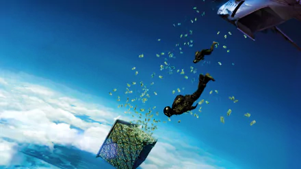 HD PC desktop wallpaper from Point Break (2015): two skydivers in black suits fall through a blue sky as scattered cash rains around a tumbling metallic cube above the clouds.