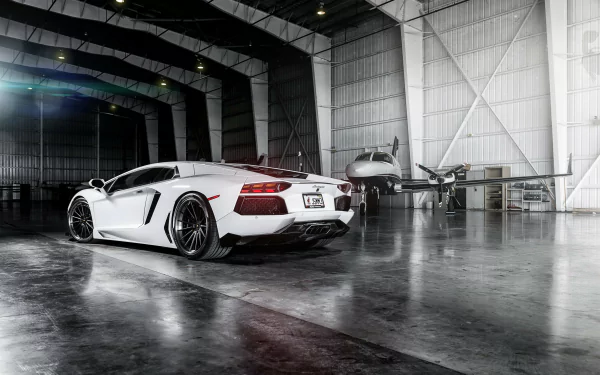 A striking Lamborghini Aventador parked in a spacious hangar, featuring sleek lines and glossy white finish, with a small airplane in the background. A stunning HD desktop wallpaper.