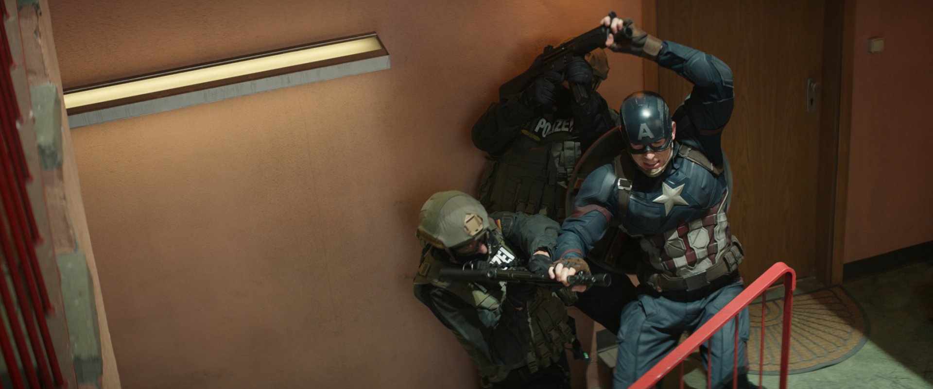 Captain America, portrayed by Chris Evans, is depicted in an intense scene from Captain America: Civil War, showcasing action and drama in this HD desktop wallpaper.