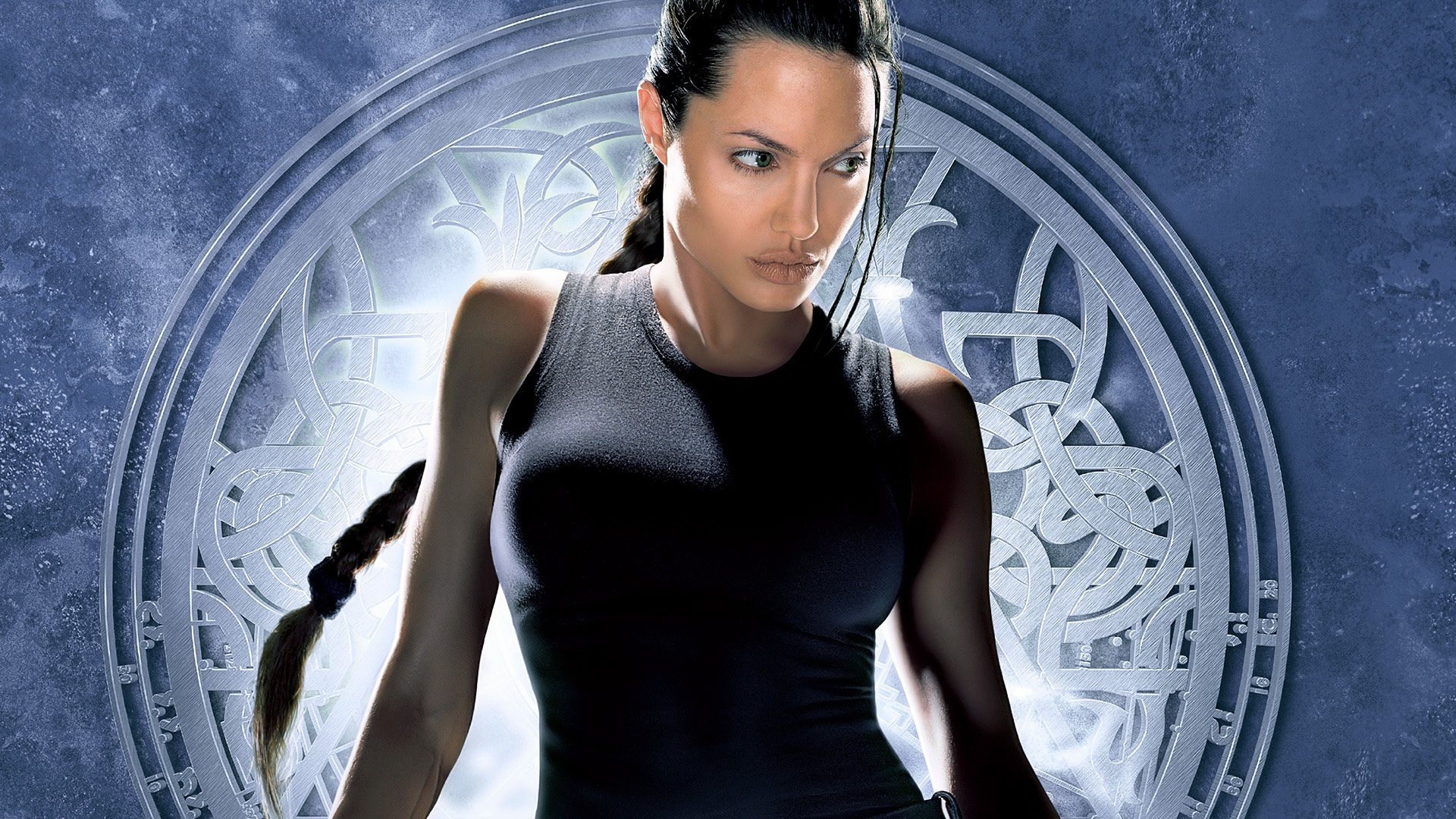HD PC desktop wallpaper featuring Angelina Jolie as Lara Croft from the movie Tomb Raider, set against a mystical, intricate circular backdrop.