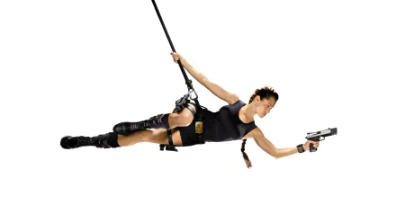 HD desktop wallpaper featuring Angelina Jolie as Lara Croft from the movie Tomb Raider, depicted in action pose with gun and harness against a white background.