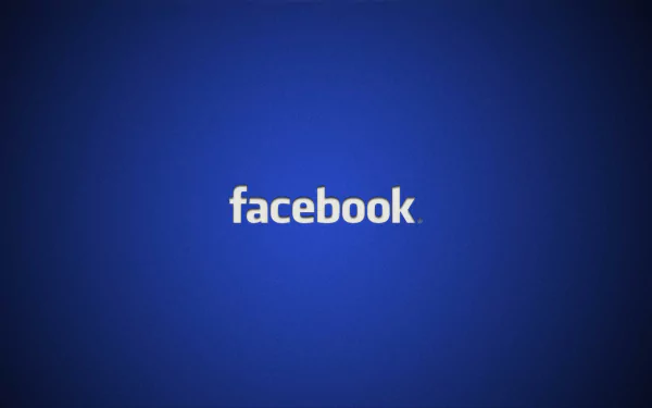 HD desktop wallpaper featuring a deep blue background with a central facebook logo in white lowercase letters.