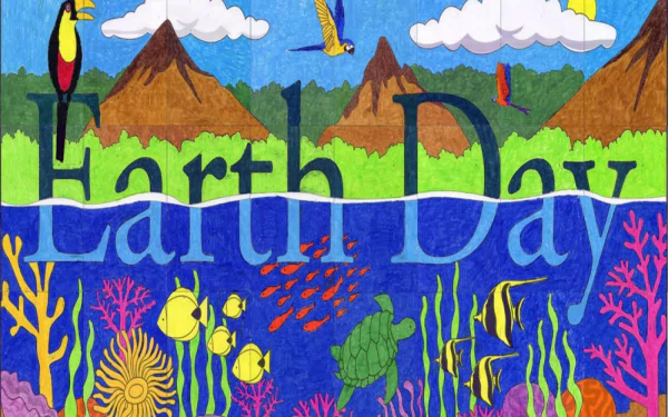 Vibrant Earth Day HD desktop wallpaper featuring mountains, colorful birds, and a diverse underwater scene with fish, coral, and a turtle celebrating the holiday.