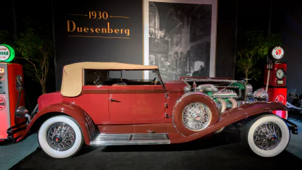 A 1930 Duesenberg Model J vintage convertible classic car displayed indoors, showcased as a 4K Ultra HD PC desktop wallpaper and background.