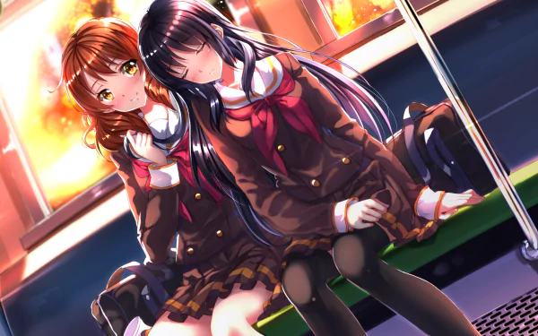 HD anime desktop wallpaper featuring Reina Kousaka and Kumiko Oumae from Sound! Euphonium, sitting closely together in warm, glowing light.