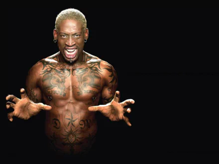 Dennis Rodman, a prominent basketball player, displays his tattoos and intense expression in this striking HD desktop wallpaper. A powerful representation of sports and personality.