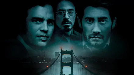 HD PC desktop wallpaper of three men's faces looming over a foggy Golden Gate Bridge, poster-style for the movie Zodiac (2007).