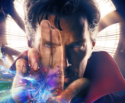 HD desktop wallpaper featuring Benedict Cumberbatch as Doctor Strange, showcasing his intense gaze and magical powers with vibrant visual effects in the background.