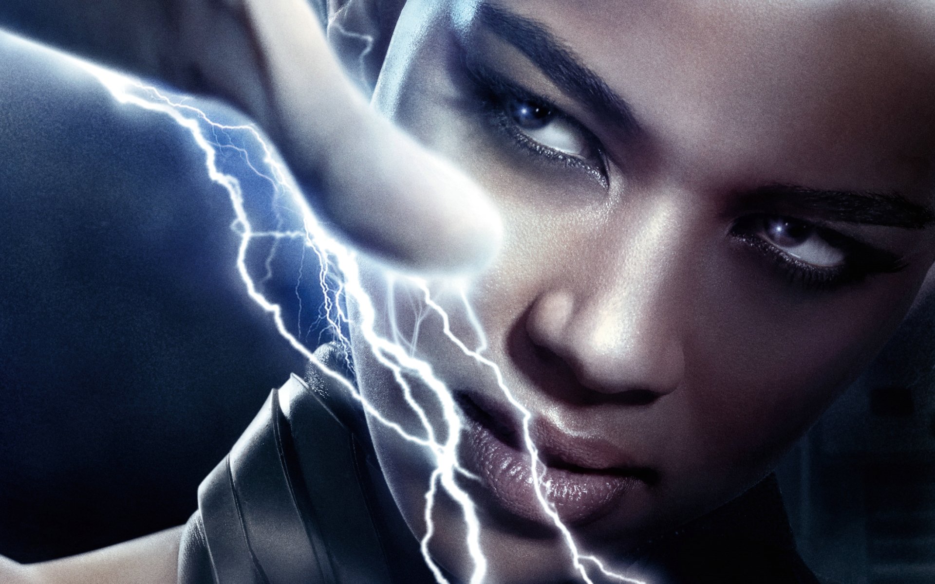 Alexandra Shipp as Storm from Marvel's X-Men: Apocalypse, showcasing her powerful presence with lightning effects in a striking HD desktop wallpaper.
