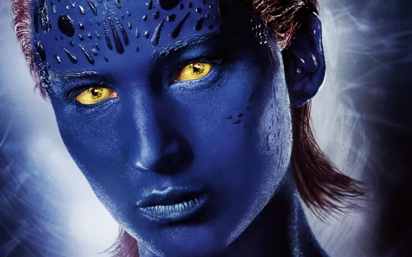 Jennifer Lawrence as Mystique in X-Men: Apocalypse, featuring her striking blue skin and yellow eyes against a dramatic backdrop. High-definition wallpaper for fans.