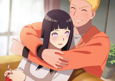 HD anime desktop wallpaper with Hinata Hyuga and Naruto Uzumaki from the series Naruto. Naruto embraces Hinata affectionately with a cheerful expression in a cozy indoor setting.