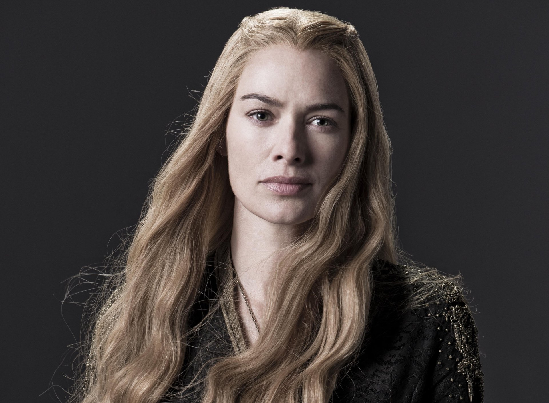 Lena Headey as Cersei Lannister from the TV show Game of Thrones, portrayed with striking features and long flowing hair in a dramatic HD wallpaper.