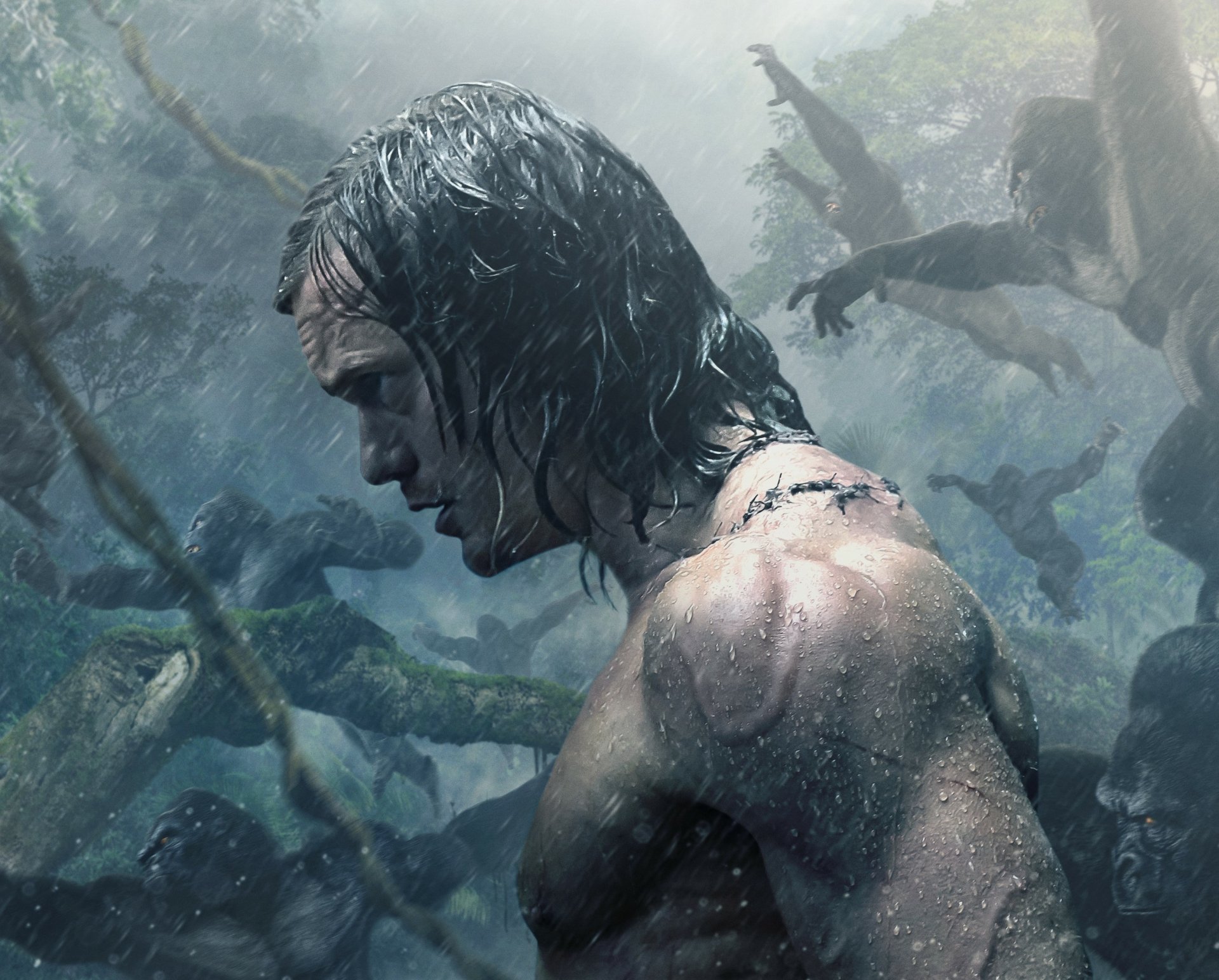 HD desktop wallpaper featuring Alexander Skarsgård as Tarzan in the movie The Legend of Tarzan, set in a misty jungle environment.