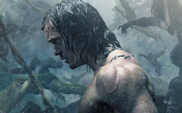 HD desktop wallpaper featuring Alexander Skarsgård as Tarzan in the movie The Legend of Tarzan, set in a misty jungle environment.