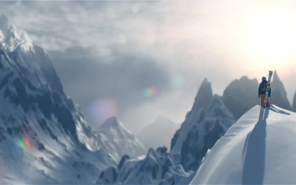 HD PC desktop wallpaper from the video game Steep, featuring a lone skier standing on a snow-covered mountain ridge with distant peaks under a cloudy sky.