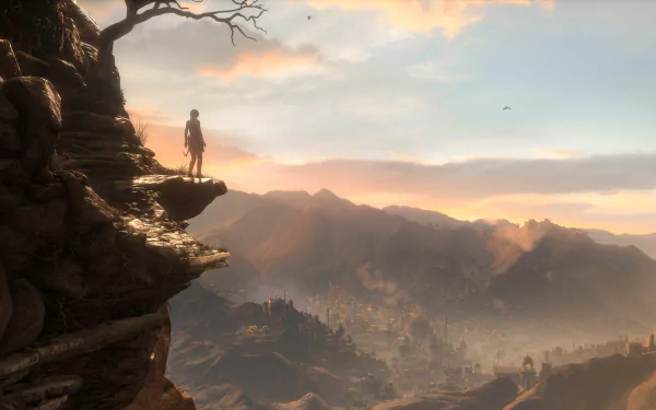 A stunning HD wallpaper from Rise of the Tomb Raider, featuring a lone figure standing on a cliff, gazing across a vast mountainous landscape at sunset.