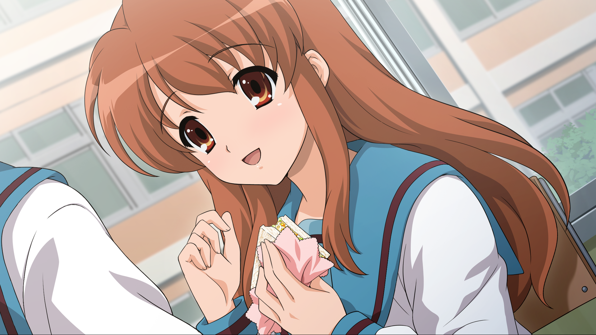 HD PC desktop wallpaper of Mikuru Asahina from The Melancholy of Haruhi Suzumiya, smiling in her blue-trim school uniform while holding a wrapped snack in a bright school hallway.