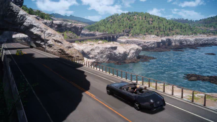 A scenic HD wallpaper from Final Fantasy XV, featuring a sleek car driving along a coastal road with lush greenery and a shimmering sea in the background.
