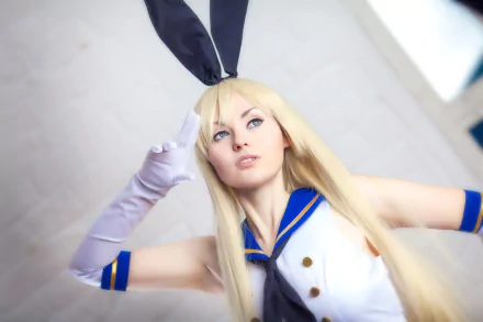 Blonde woman cosplaying Shimakaze from Kantai Collection in a 4K Ultra HD desktop wallpaper, featuring her iconic sailor outfit and bunny ears.