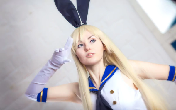 Blonde woman cosplaying Shimakaze from Kantai Collection in a 4K Ultra HD desktop wallpaper, featuring her iconic sailor outfit and bunny ears.