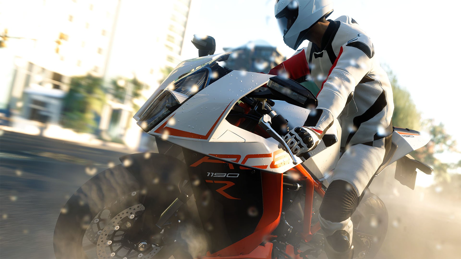 HD PC desktop wallpaper: a motorcyclist from the video game The Crew leans into a dusty turn, motion blur and speed emphasized.