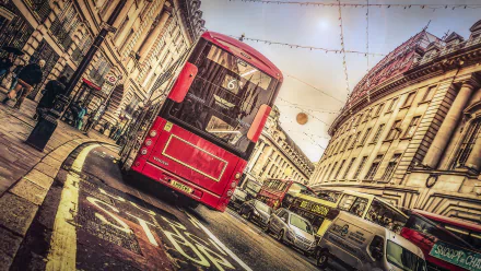 HD desktop wallpaper featuring a red Volvo double-decker bus on a busy London street with historic buildings and festive lights overhead.