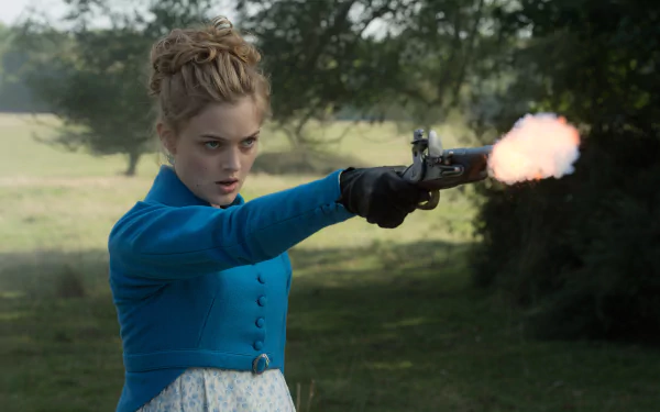 Pride and Prejudice and Zombies movie wallpaper: woman in blue Regency dress firing a pistol across a sunlit grassy field, 2K Quad HD PC desktop background.