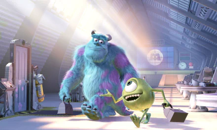 HD PC desktop wallpaper: Monsters, Inc. scene with Sulley and Mike Wazowski walking through the factory carrying briefcases, sunlight streaming in.