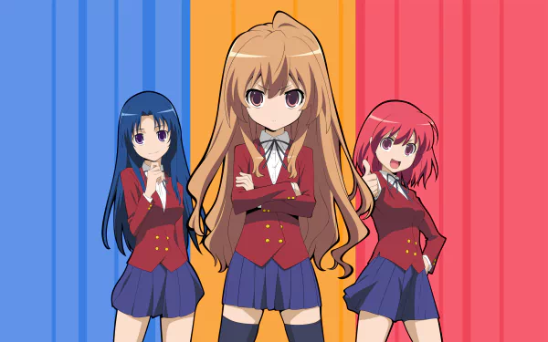 Three anime characters from Toradora!—Taiga Aisaka, Ami Kawashima, and Minori Kushieda—pose confidently against a vibrant blue and red background, showcasing their distinct styles in skirts.