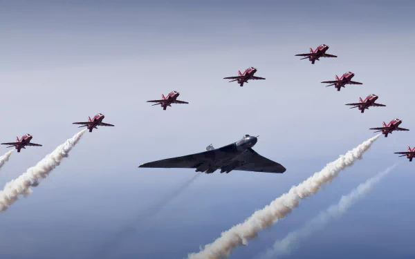 Avro Vulcan bomber leads a formation of military warplanes flying at an air show, captured in stunning 4K Ultra HD for a PC desktop wallpaper and background.
