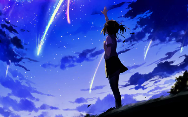 HD desktop wallpaper depicting Mitsuha Miyamizu from the anime Your Name, standing on a hill beneath a stunning, starry night sky with meteor showers.