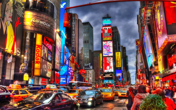 A vibrant night scene of Times Square in New York, showcasing colorful skyscrapers and bustling traffic, captured in stunning 4K Ultra HD, highlighting the energy of the city.