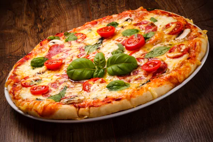 4K Ultra HD PC desktop wallpaper featuring a delicious pizza topped with fresh tomato slices, melted cheese, and green basil leaves on a wooden surface.