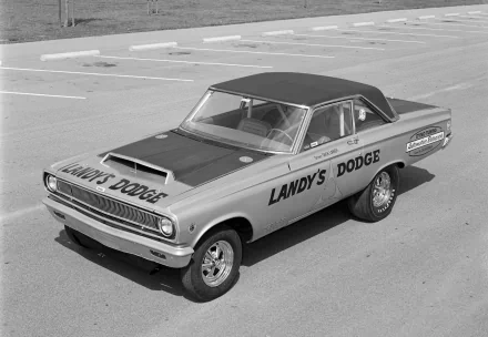1965 Dodge Coronet muscle car with Landy's Dodge livery parked in an empty lot — 4K Ultra HD PC desktop wallpaper/background.
