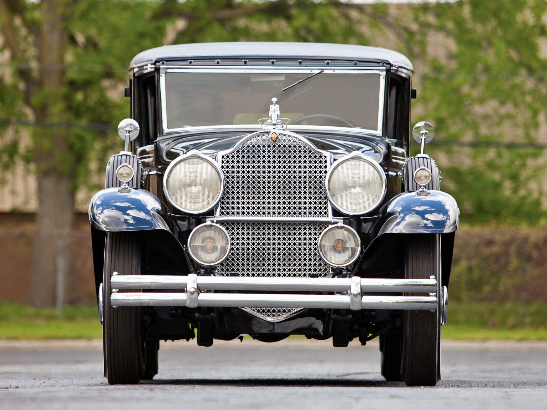 Front view of a vintage 1930 Packard Deluxe Eight All-Weather Town Car, showcased as an HD PC desktop wallpaper and background.