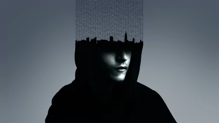 A striking HD wallpaper from the TV show Mr. Robot, featuring a hooded figure with a city skyline and lines of code blending into their head, creating a mysterious and tech-inspired atmosphere.