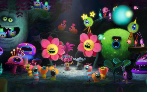 Colorful HD wallpaper featuring characters from the movie Trolls, showcasing vibrant flowers, friendly trolls, and whimsical creatures in a lively forest setting.