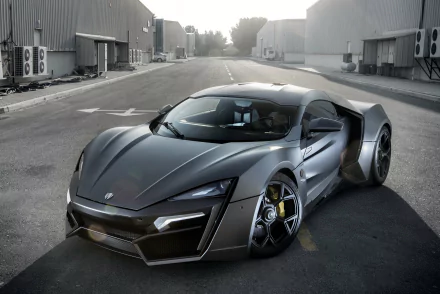 A sleek Lykan HyperSport showcased on an empty road, captured in stunning HD, makes for a striking desktop wallpaper and background.