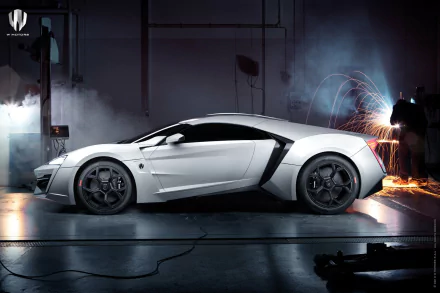 Sleek white Lykan HyperSport vehicle parked in a dim garage amid sparks and smoke — HD PC desktop wallpaper background.