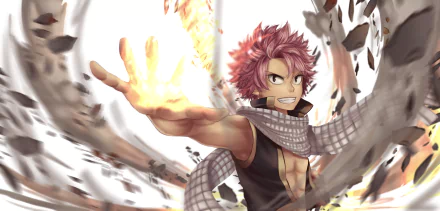 Natsu Dragneel from the anime Fairy Tail unleashes his fiery power in this dynamic HD desktop wallpaper, showcasing his fierce expression and iconic scarf.