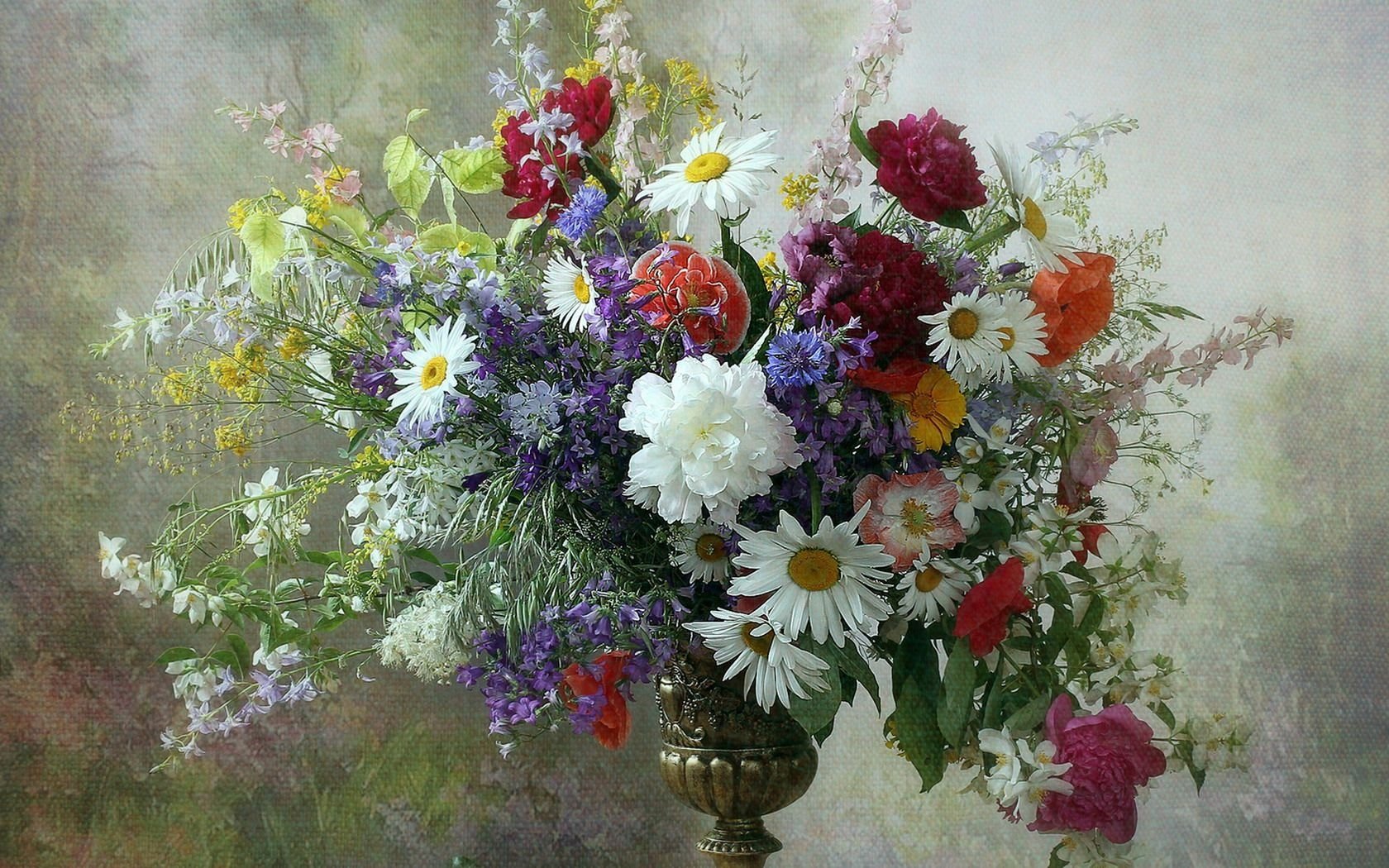 HD PC desktop wallpaper featuring a colorful still life photograph of a vase filled with vibrant flowers, including daisies, roses, and other blossoms.