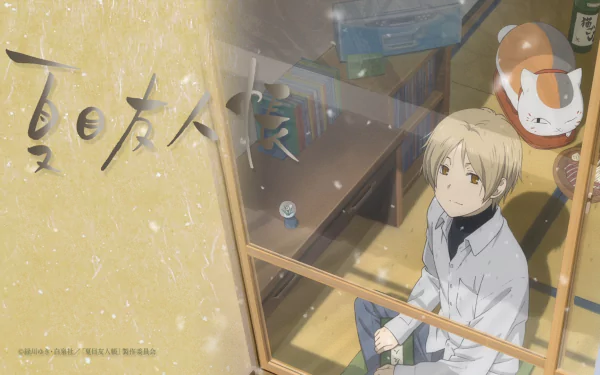 A serene HD wallpaper featuring Natsume from Natsume Yuujinchou, gazing thoughtfully while surrounded by a cozy interior, capturing the essence of the beloved anime series.