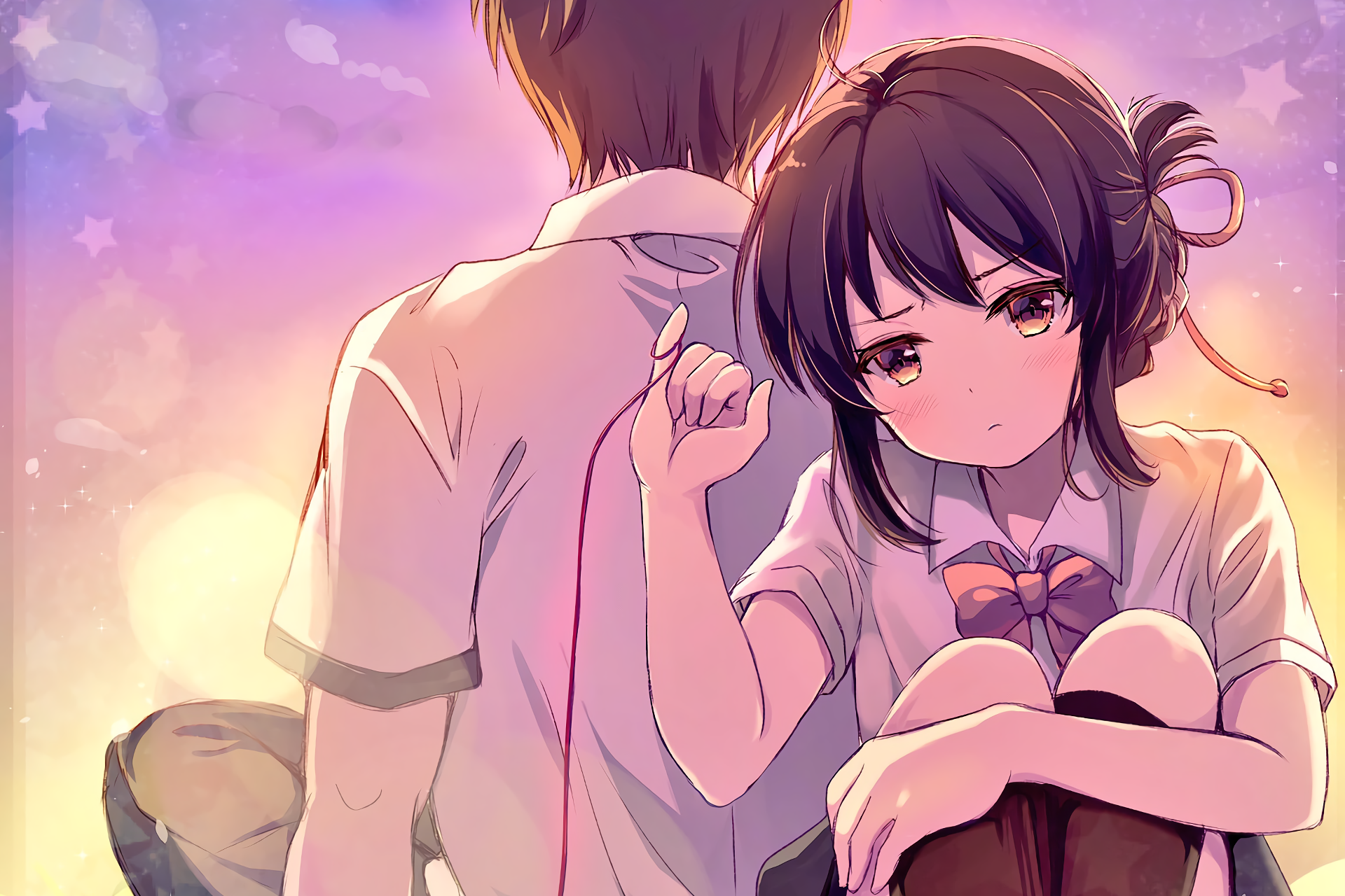 A vibrant HD wallpaper featuring Taki Tachibana and Mitsuha Miyamizu from Your Name, capturing a moment of connection against a dreamy sunset backdrop.