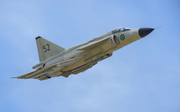 Saab 37 Viggen military jet fighter warplane soars against a clear blue sky in this 4K Ultra HD aircraft desktop wallpaper.