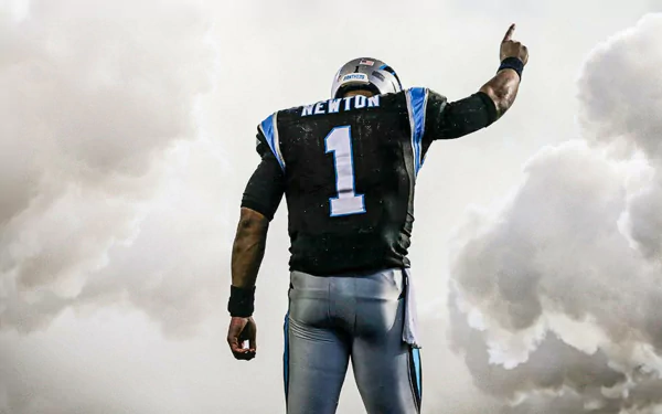 HD desktop wallpaper of Cam Newton with his back turned, jersey number 1 visible, pointing upwards against a cloudy sky background.