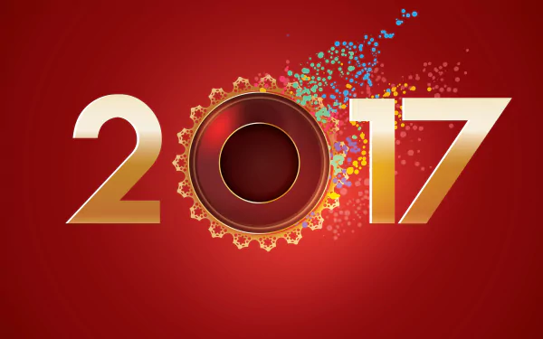 Colorful New Year 2017 holiday HD PC desktop wallpaper showing gold 2017 numerals on a red background with a decorative circular motif and confetti burst.
